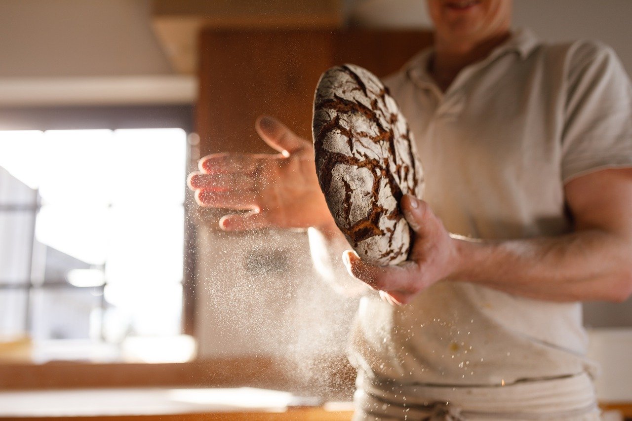 man baking bread